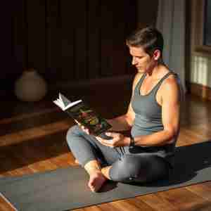 A yogi incorporating reading into his routine